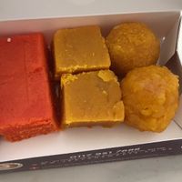 Mango barfi, besan, ladoos  at Jeevans Sweets in Bristol