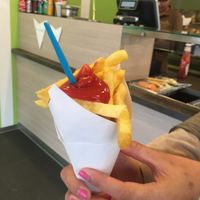 Friet! Home made french fries, freshly cut and fried in front of you with delicious local potatoes. at Vega Snacks in Hilversum