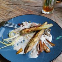 Half eaten masala yoghurt with aubergine++ at De Herbivoor in Groningen