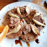 Mini pancakes with fruit and syrup (great portion, super filling!) at De Herbivoor in Groningen