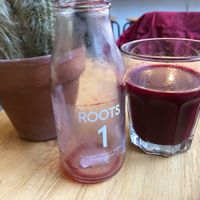 Red beet, apple, carrot, lemon and mint juice at ROOTS - Amstelveenseweg in Amsterdam