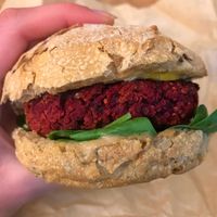 Beet burger with roasted pumpkin and tahini dressing at ROOTS - Amstelveenseweg in Amsterdam