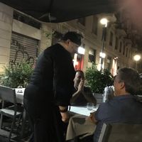 Owner/chef greeting the customers at BistroBio in Milan