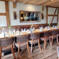 Interior (chairs are probably covered with leather) at Taufsteinhutte in Schotten