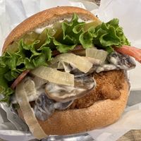 Creamy mushroom burger with pickles and bacon added   at VeganBurg in San Francisco