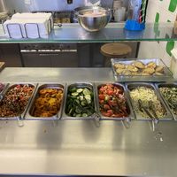 You make the pita yourself! at Maoz - Albertcuypstraat in Amsterdam