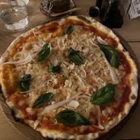 Vegan pizza with added onions and garlic   at In Bocca Al Lupo in Lisbon