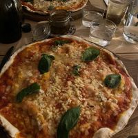 Vegan pizza with garlic. Chilli oil to add yourself   at In Bocca Al Lupo in Lisbon