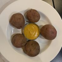 Papas “canarias”. Es curry  at The Mantraa in Barcelona