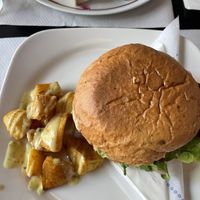 Seitan burger and patatas bravas  at The Mantraa in Barcelona
