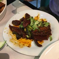 Sundried tomatoes with chilli, sesame, lemon and garlic)  at The Mantraa in Barcelona