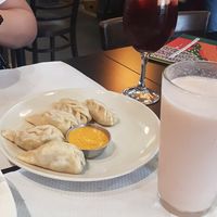 Amazing momo's!! ❤️ And yumyum milkshake. at The Mantraa in Barcelona