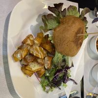 Seitan burger and patatas bravas !  at The Mantraa in Barcelona