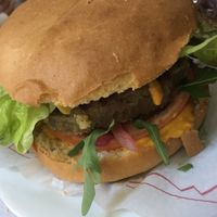 Tofu burger with peanut sauce  at The Mantraa in Barcelona