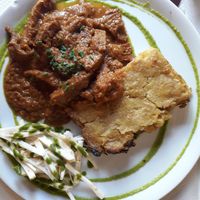 Estopad de seitan y girgola con tarta de patata y ensalada at The Mantraa in Barcelona