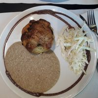 Nidos de patata y queso vegano  con salsa berenjena y ensalada at The Mantraa in Barcelona