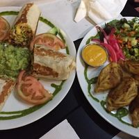 Guacamole and cheese wraps and dumplings  at The Mantraa in Barcelona