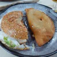 Half a bagel and Spanish empanadilla at Crock and cock in Bilbao