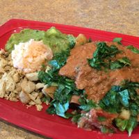 Crispy flautas smothered by toppings of vegan chicken and delicious chipotle sauce. at La Blue Casa in Arlington