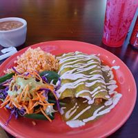 Chik'n enchiladas verdes with rice, Ranchero beans, salad at Viva Vegeria in San Antonio