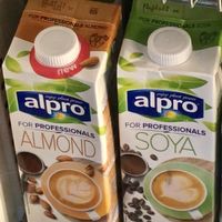 Alpro For Professionals almond and soya milk in the fridge at Deli Flavour in Leicester