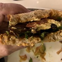 Nom nom!  Smoky eggplant sandwich.  Order it now! at The Coronado PHX in Phoenix