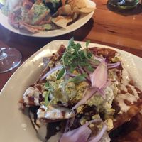 Chilaquiles (in front) fried guacamole (back)  at The Coronado PHX in Phoenix