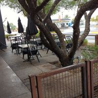 Outside. It's raining! Normally this would be a nice area and I would definitely have eaten outside if it didn't seem like rain was coming. at The Coronado PHX in Phoenix