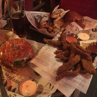 Vegan nuggets on the right, cheeseburger on the left  at Shuffle Pub in Tel Aviv