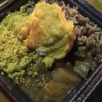 Pratinho de vatapá, moqueca, baião e farofa.  at Malagheta Culinaria Vegana in Fortaleza