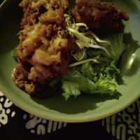 Entrée: patties with homemade peanut sauce and salad at Cafe Bali in Saarbrucken