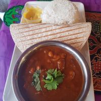Banging chickpea curry with rice roti and popadum for under £10 at Cafe Shanti in Lincoln