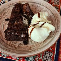 Gluten free chocolate brownie with ice cream at Cafe Shanti in Lincoln