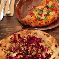 Funghi e radicchio with walnuts and vegan blue cheese and Calzone with vegan ricotta & spinach.  at Gigi Pizzeria in Newtown