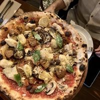 Carciofi e funghi with added sausage  at Gigi Pizzeria in Newtown