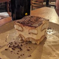 $14 tiramisu slice. It is not big. It is not $14 worthy 😭 at Gigi Pizzeria in Newtown
