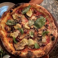 Capriccio - San Maranzo tomato, smoked hemp mozzarella, eggplant, artichokes, mushrooms, olives, garlic, topped with green vie Parmesan, basil & extra olive oil.  at Gigi Pizzeria in Newtown