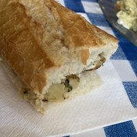 La mitad del bocadillo de tortilla 🤩👌  at Somos Lo Que Comemos in Tenerife