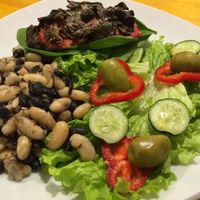 zucchini rolls, onion with mushrooms, tomatoes, mijo, spinach and peanut butter with side salad with legumes.

Picture taken by RasLok team at RasLok in Buenos Aires