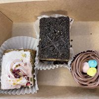 Pistachio bar, death bar, chocolate cupcake with Easter eggs.   at Valhalla Bakery in Orlando