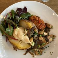 The vegan lunch option for February- baked potatoes and mushrooms with chimichuri and salad  at Margarete in Frankfurt