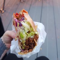 Gyro with a few bites taken out of it at Vegan Gyros - Mauer Park - Food Truck in Berlin