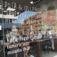 Signage on window showing healthy probiotics at Nalinis Wholesome Streetfood - Bondi Junction in Bondi Junction