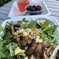 Portobello mushroom salad w side of berries & berry kombucha  at Real Raw Organics in Ocean City