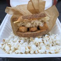 Rueben with a side of popcorn  at Real Raw Organics in Ocean City