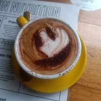 happycino (almond capp) at Serotonin Eatery in Burnley