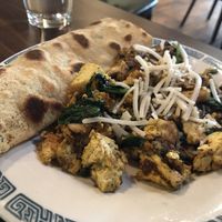 Tofu scramble (with spinach, mushroom, and vegan cheese) and chapati  at Annapurna's World Vegetarian Cafe - UNM in Albuquerque
