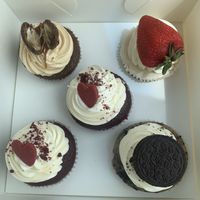 Red velvet, cheesecake, sticky date and cookies & cream cupcakes  at V Series in Kew
