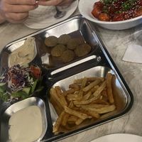 8 piece Falafel (vegan except garlic sauce) & tofu Manchurian curry😄both very delicious, big portions of the curry   at EL Cafe International Vegan Food in Phan Thiet