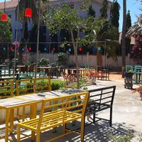Center waterfall and dining area at EL Cafe International Vegan Food in Phan Thiet